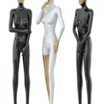 Three female mannequin with a golden face 41