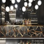 A bar counter with a beautiful backlight and a collection of alcohol. Restaurant