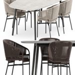 Cricket chairs and Ellisse table by Varaschin