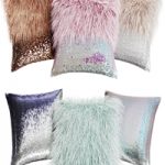 A set of decorative pillows with fur and sequins