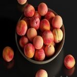 Peaches in a Ceramic Bowl